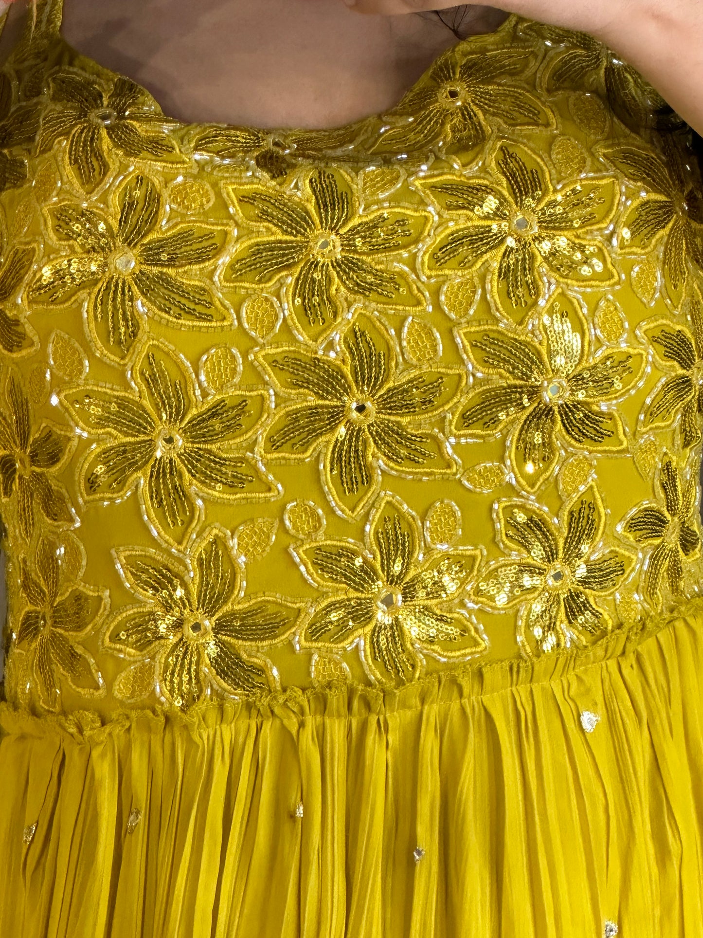 Yellow handwork gown.