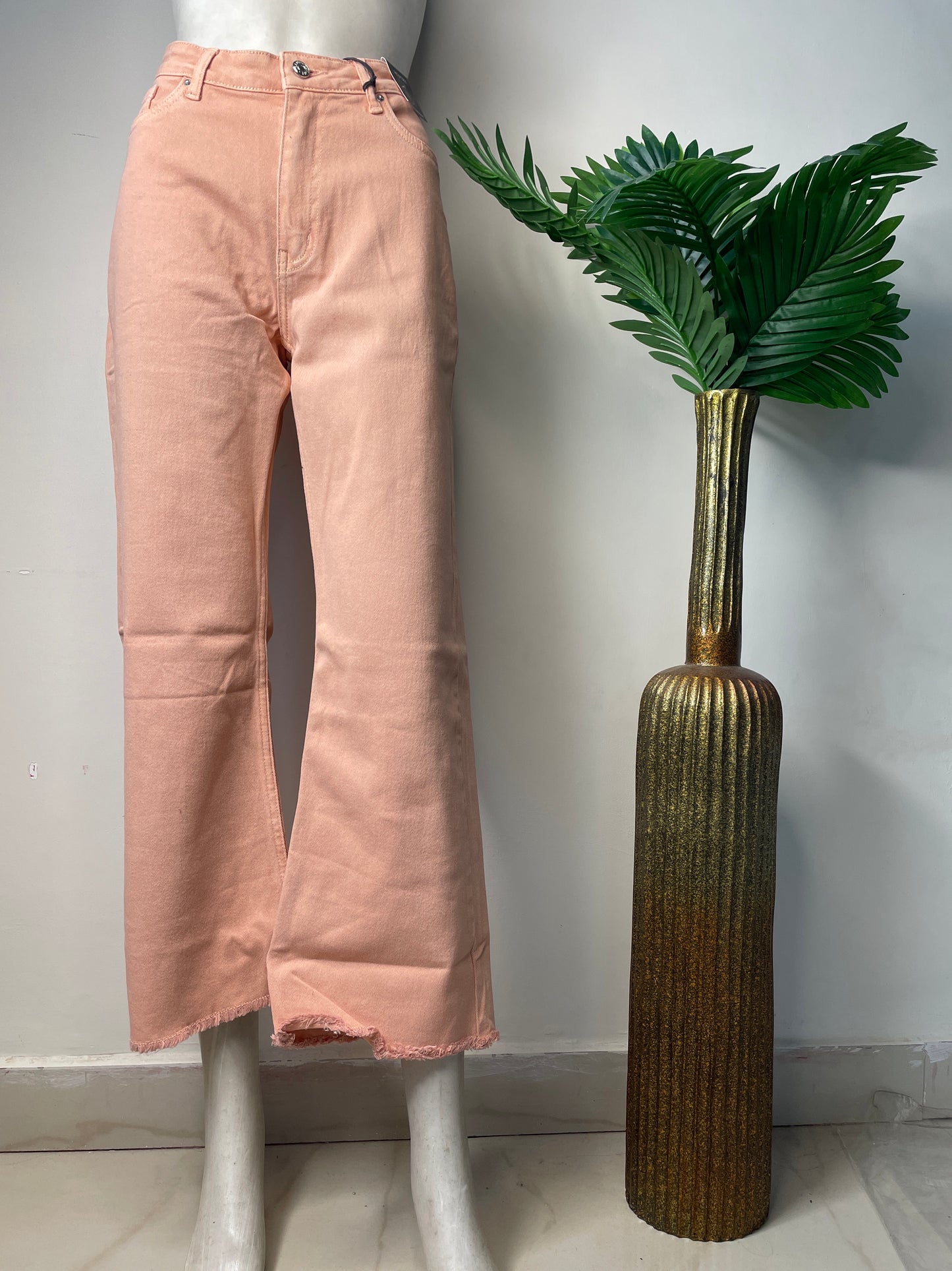 Peach bell bottom denim