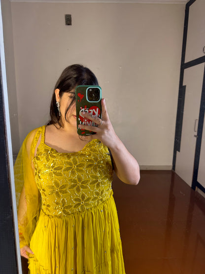 Yellow handwork gown.